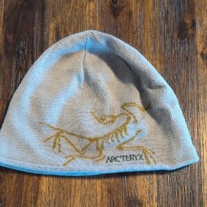 Arc'teryx Gray Beanie with Gold Design